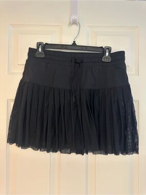 JoyLab Black Pleated Mesh Drawstring Athletic Mini Skirt